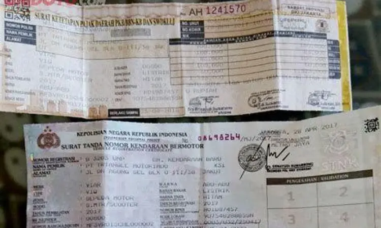 Dokumen STNK dan TBPKP asli hasil perpanjangan online