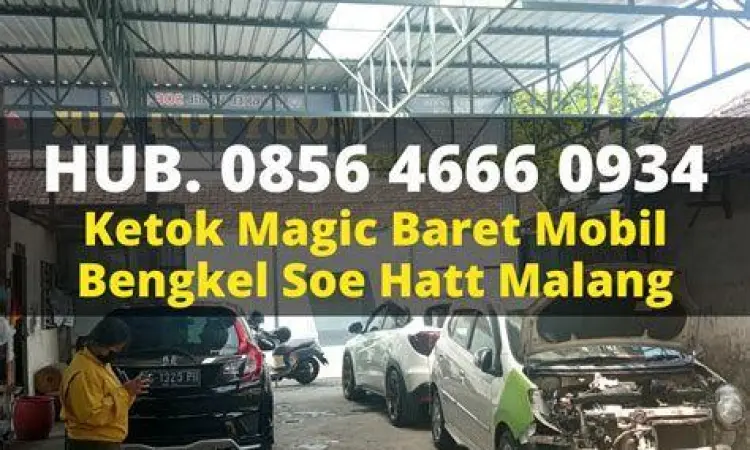Suasana di dalam bengkel ketok magic yang sedang mengerjakan mobil penyok