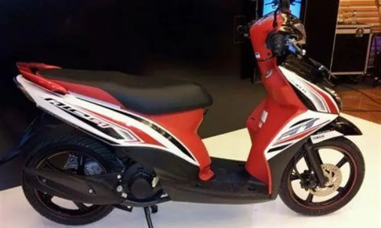 Detail lampu depan dan grill Yamaha Mio GT yang agresif